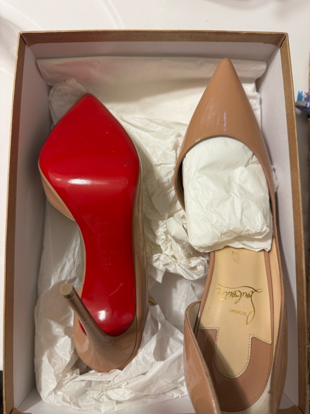 Christian Louboutin Nude Patent Pointed-Toe Pumps with Red Sole